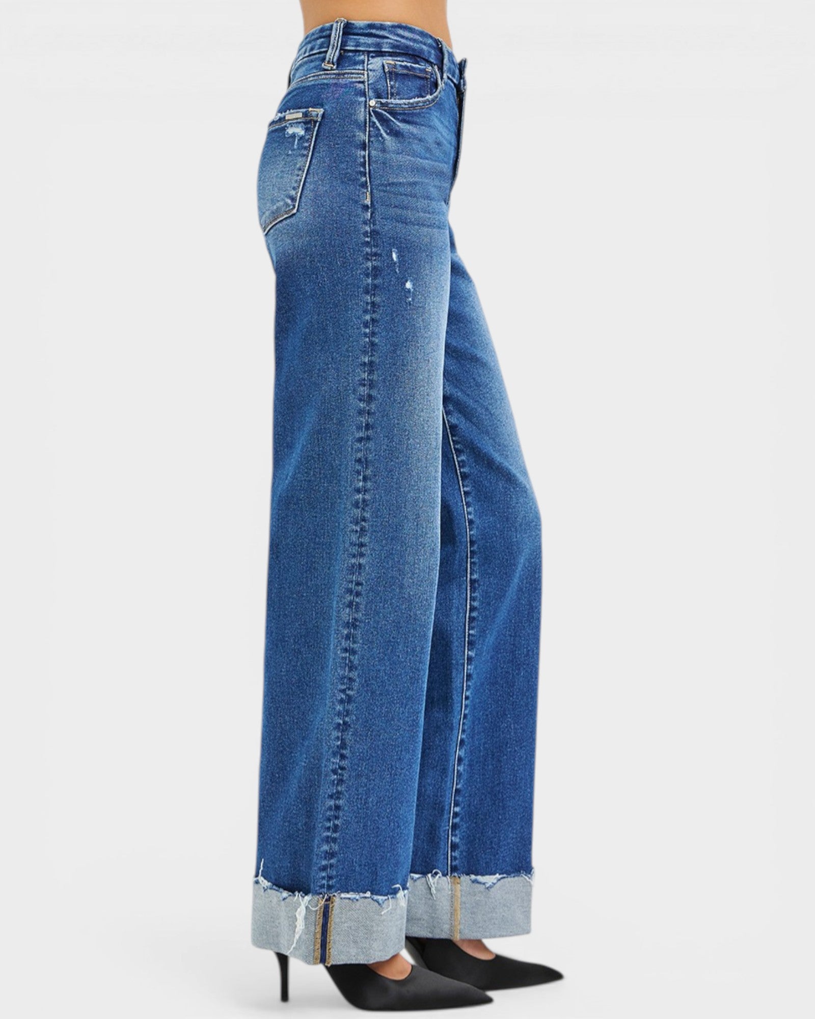 Blue jeans with a white background