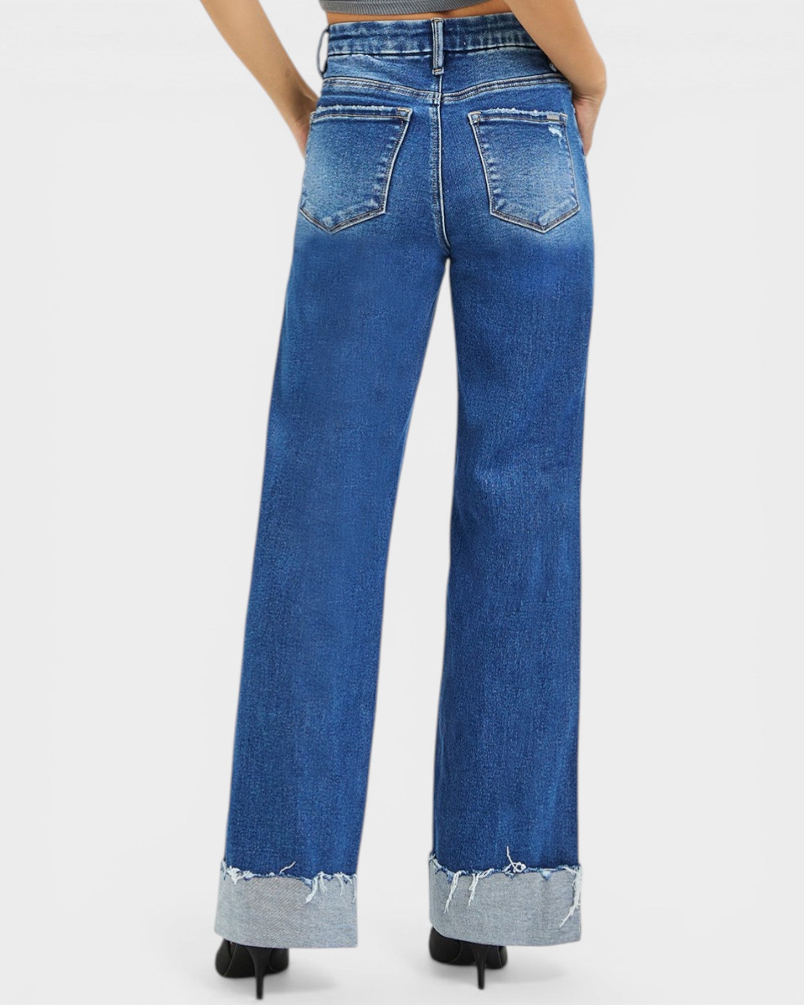 Blue jeans with a white background