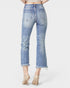Blue jeans worn by a person on a white background