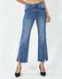Blue jeans with a slit on a white background