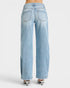 Light blue jeans worn by a person on a white background