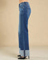 Blue jeans with a beige background