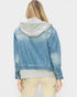 Person wearing a blue denim jacket with a gray hoodie on a white background