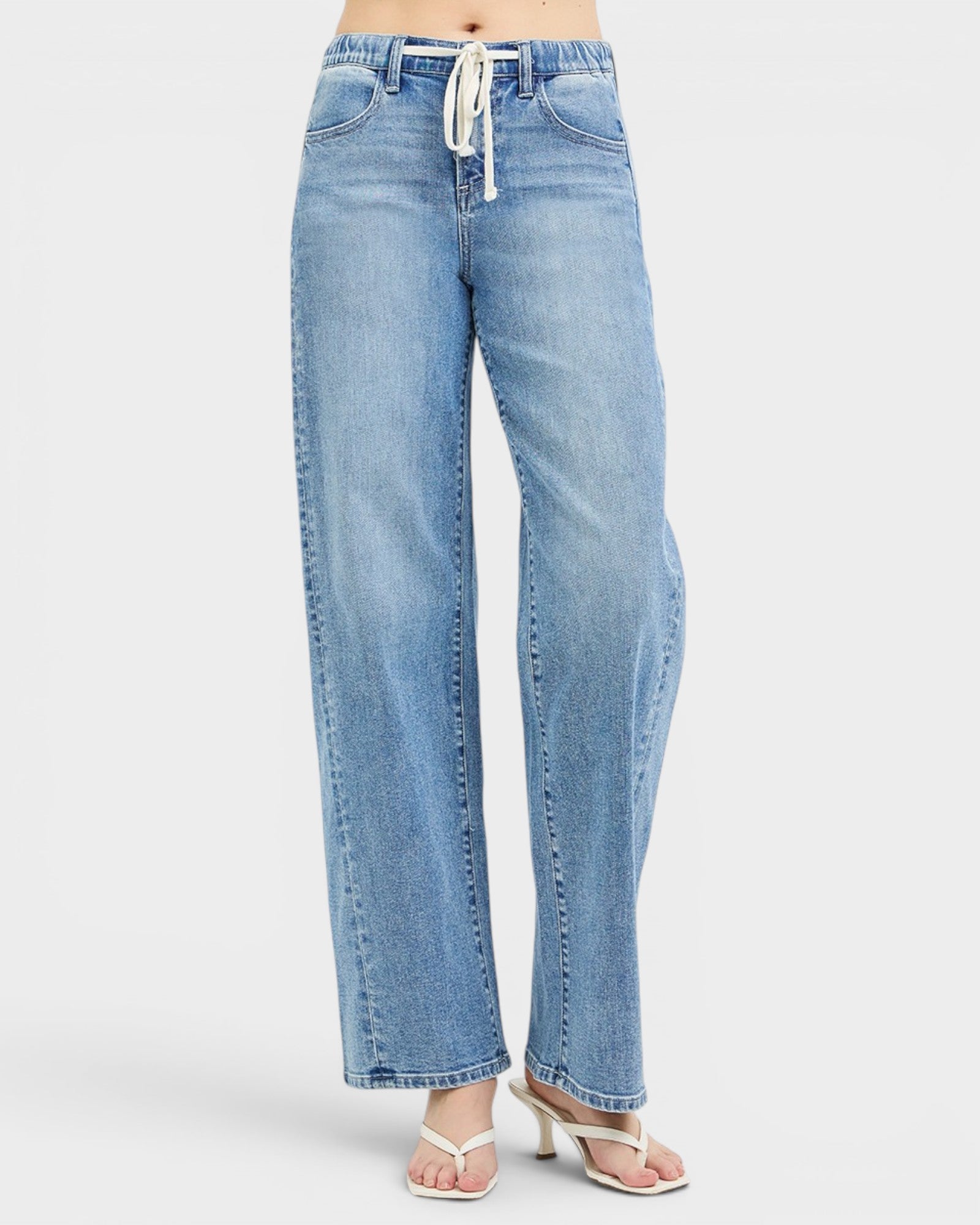 Light blue jeans on a white background