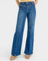 Blue jeans worn by a person on a white background