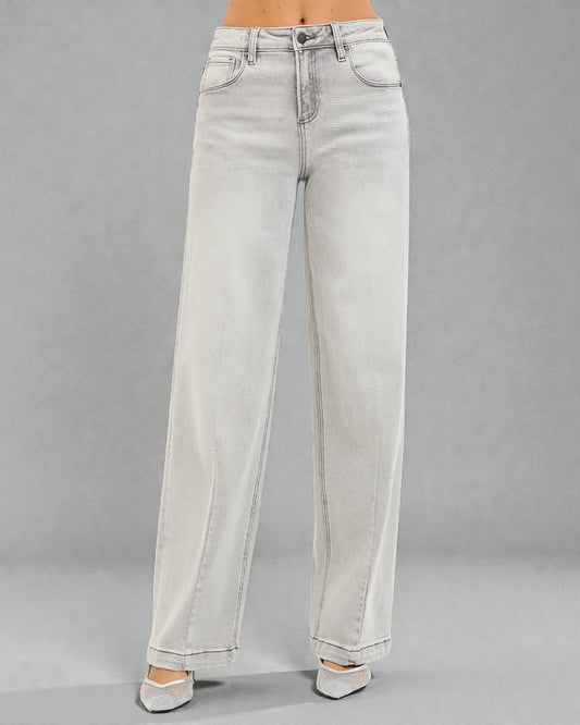 Light blue jeans on a gray background