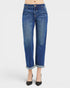 Blue jeans worn by a person on a white background