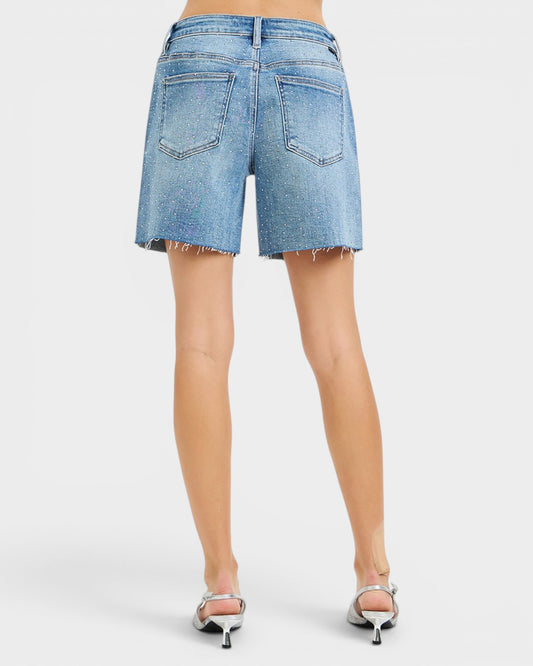 Light blue denim shorts on a white background