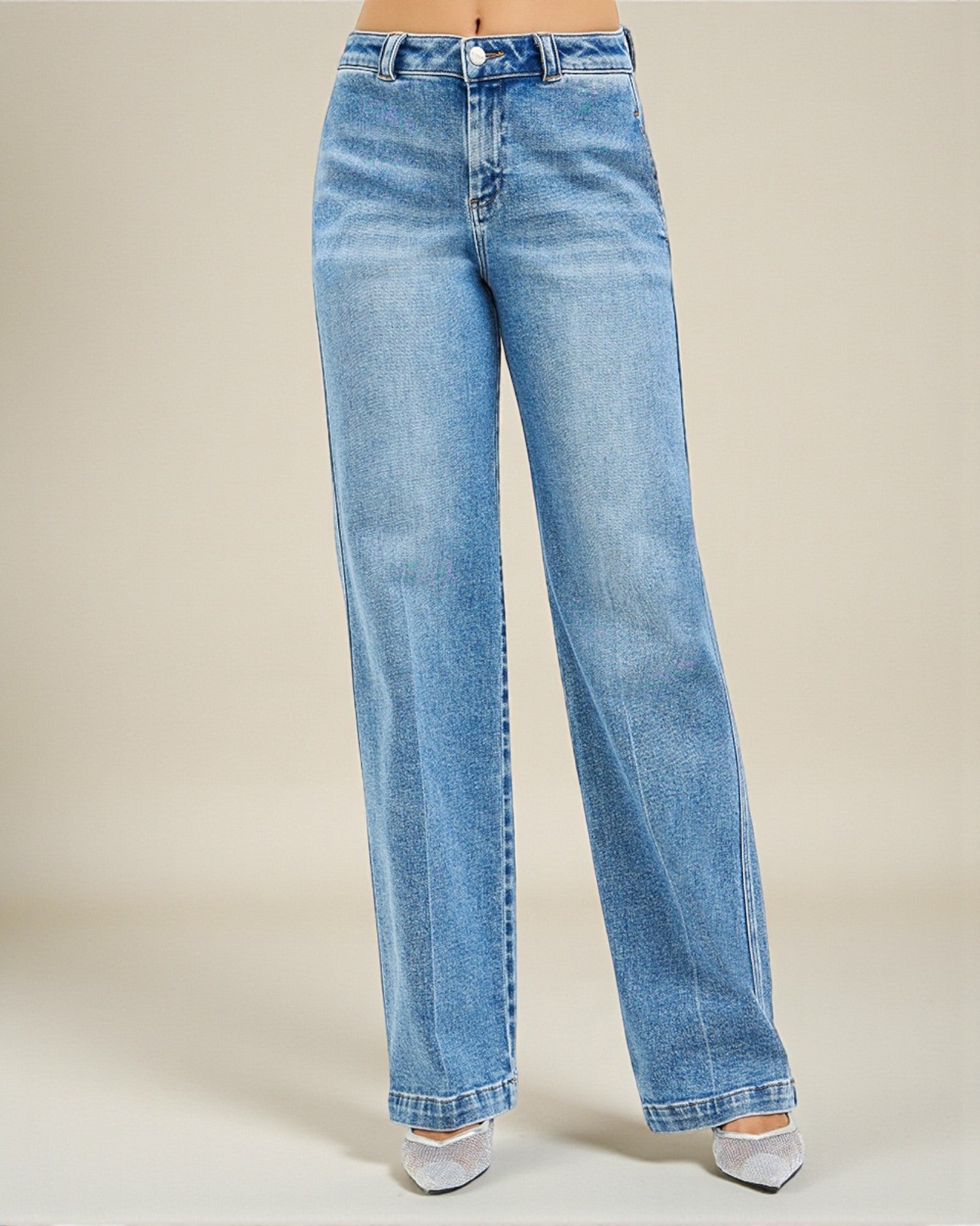 Light blue jeans on a neutral background