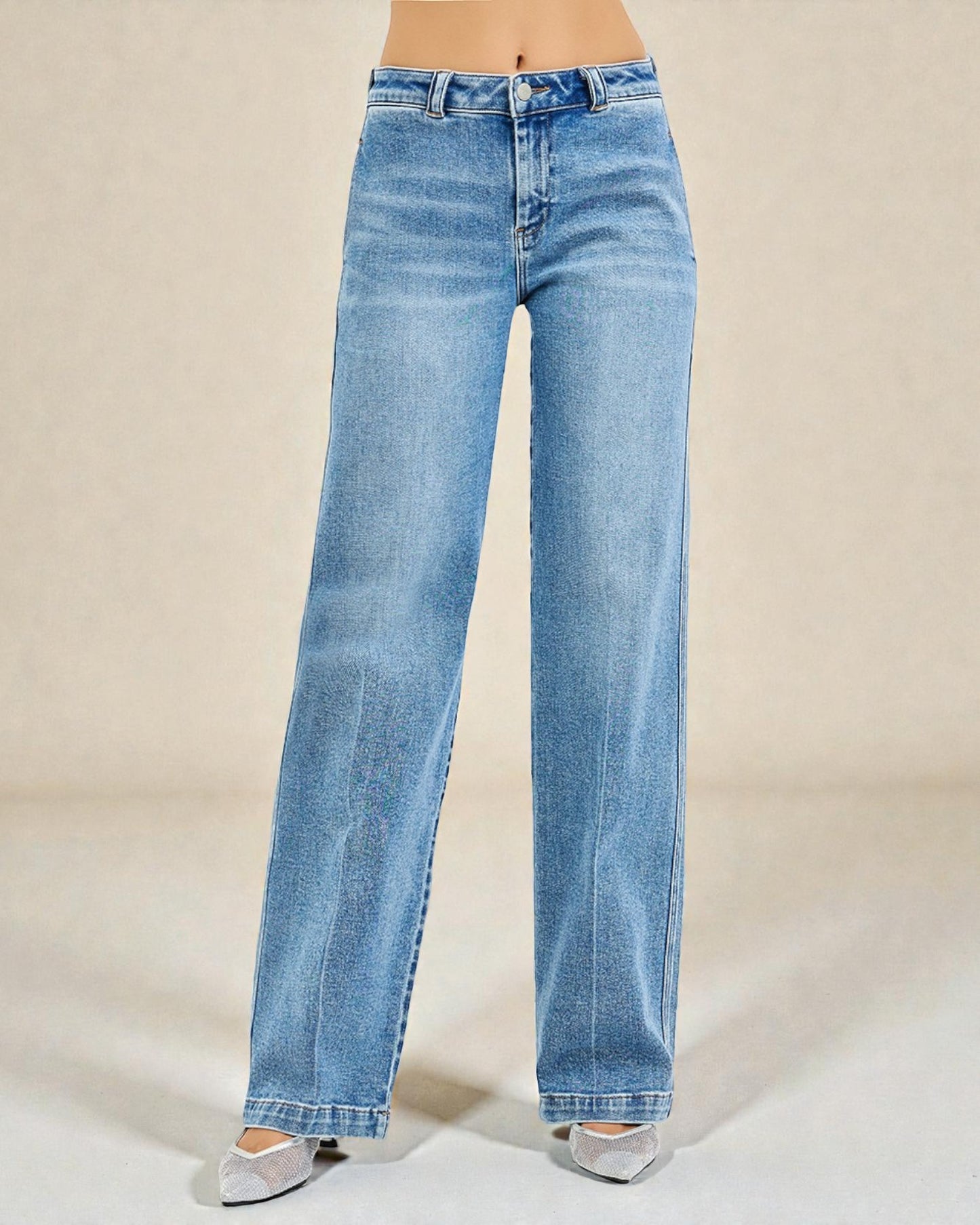 Light blue jeans on a neutral background