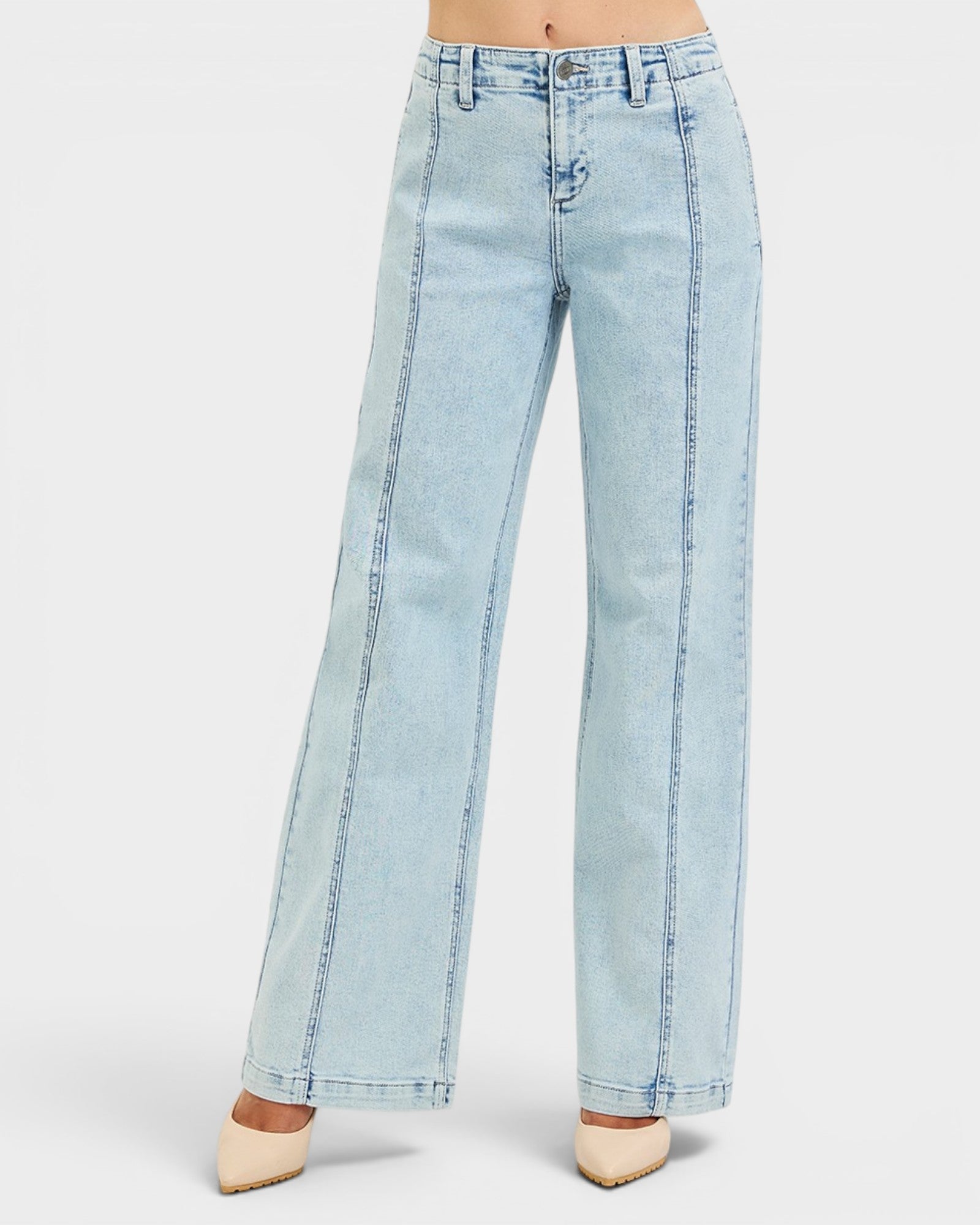 Light blue jeans worn by a person on a white background