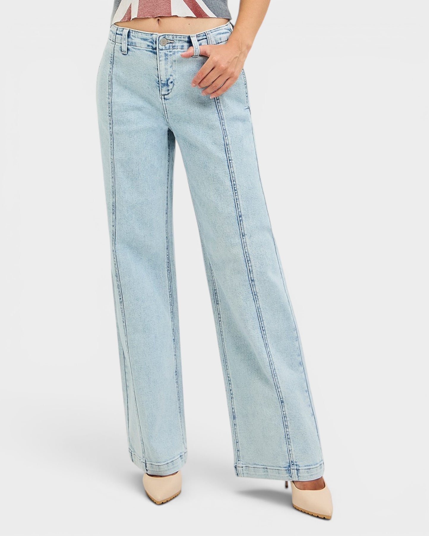 Light blue jeans worn by a person on a white background