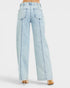Light blue jeans worn by a person on a white background