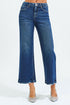 Blue jeans worn by a person on a white background
