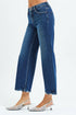 Blue jeans worn by a person on a white background