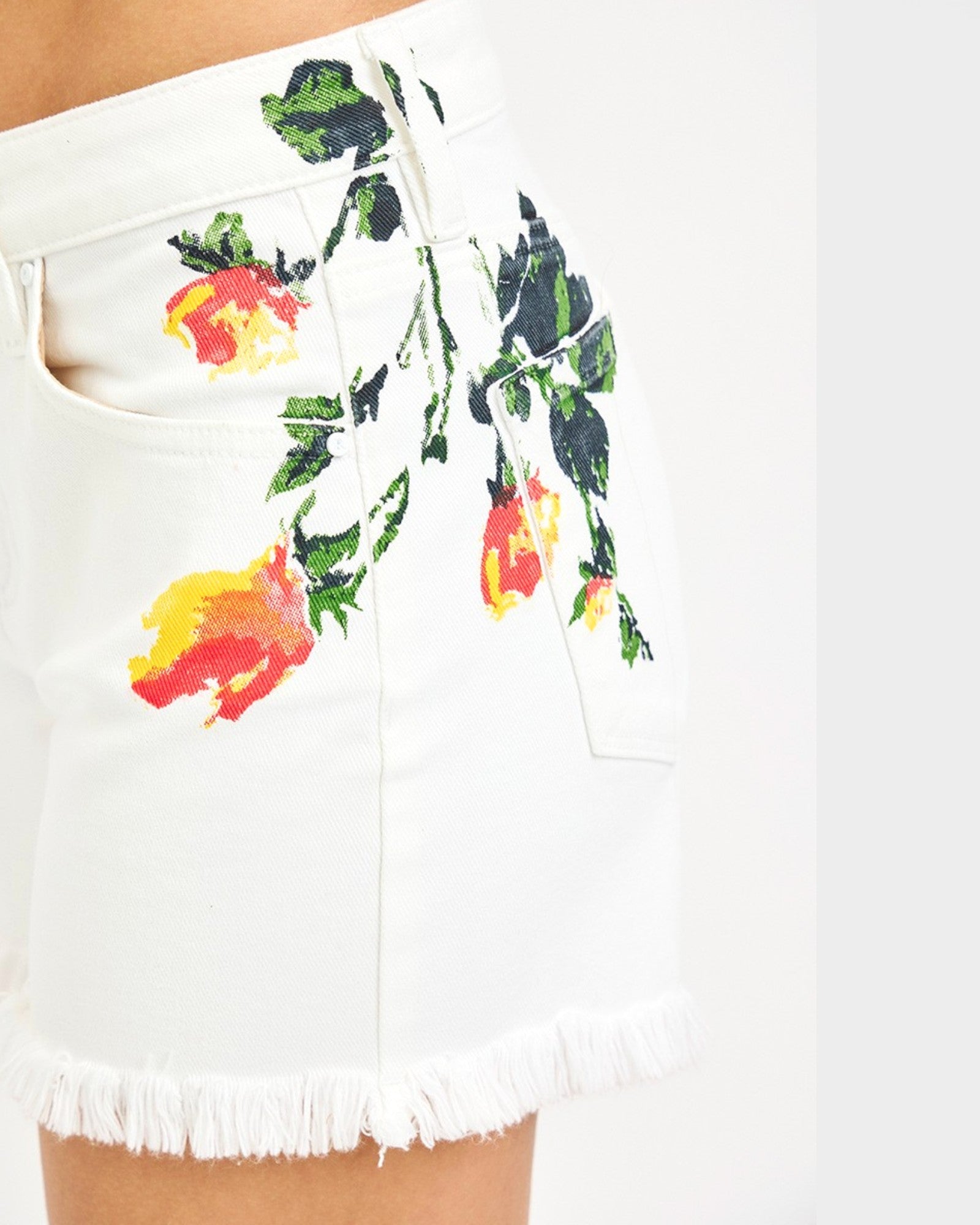 White shorts with colorful floral print on a white background