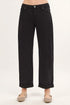 Black jeans worn by a person on a white background