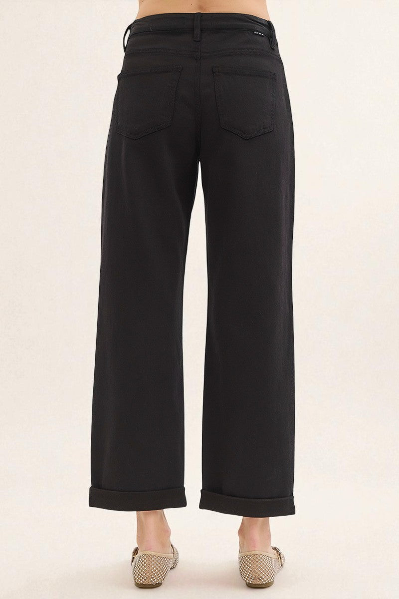 Black pants on a plain background