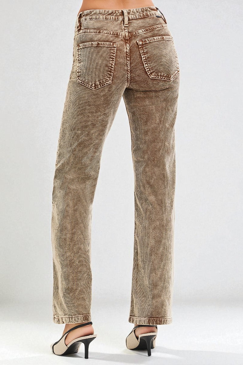 Brown acid-wash jeans on a white background