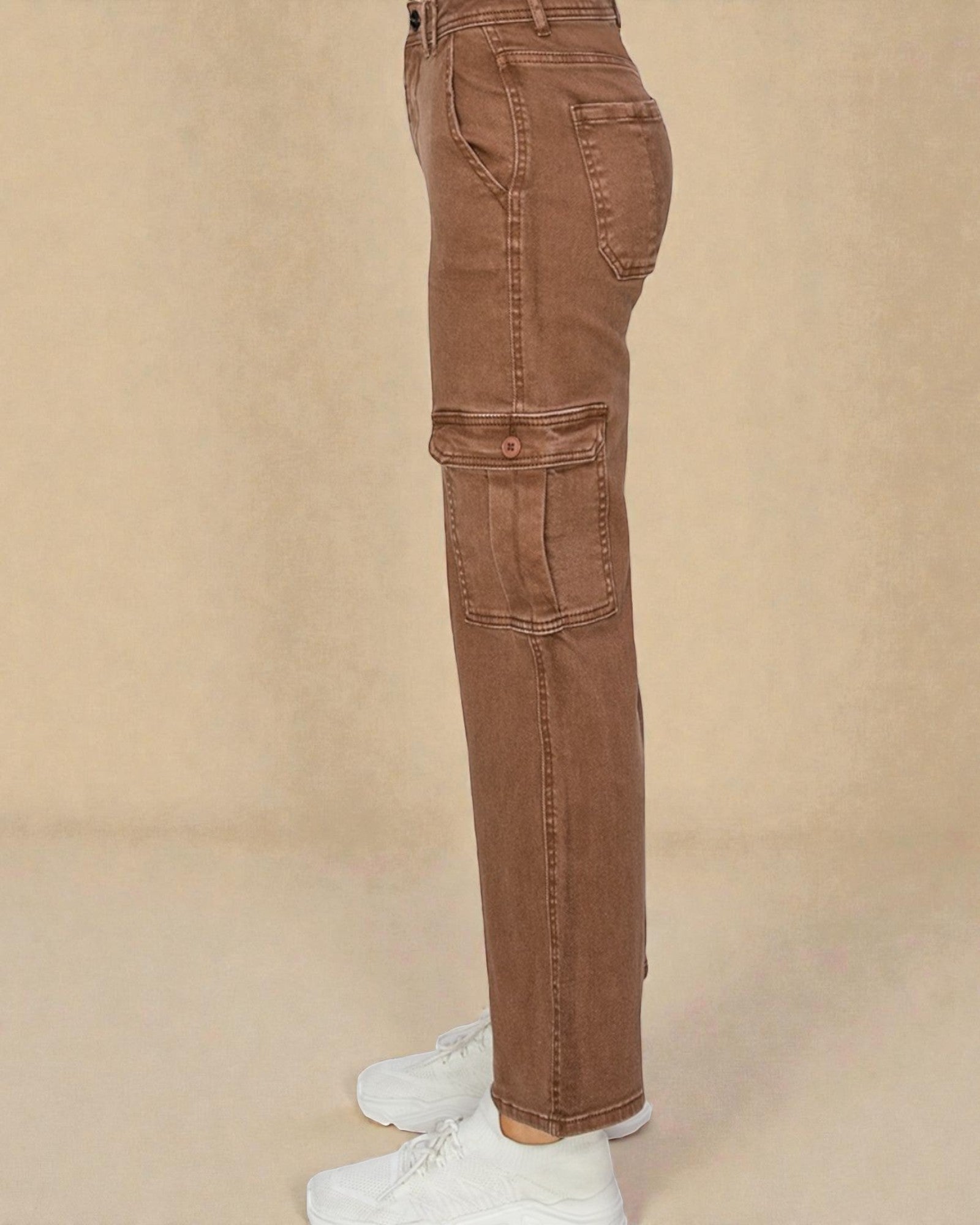 Brown cargo pants on a beige background