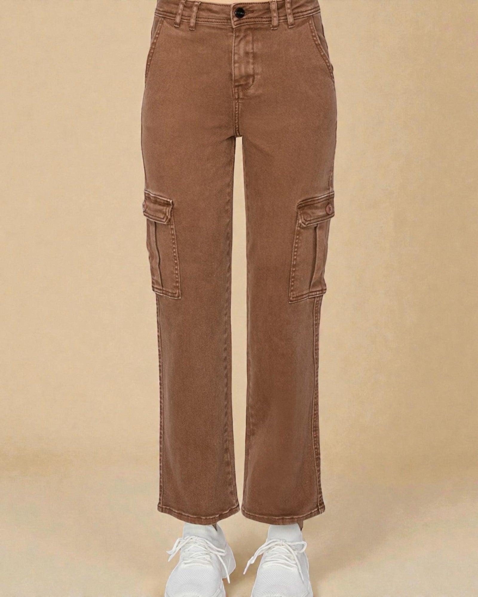 Brown cargo pants on a beige background