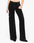 Black wide-leg cargo pants with a corduroy texture, modeled on a person against a plain white background.