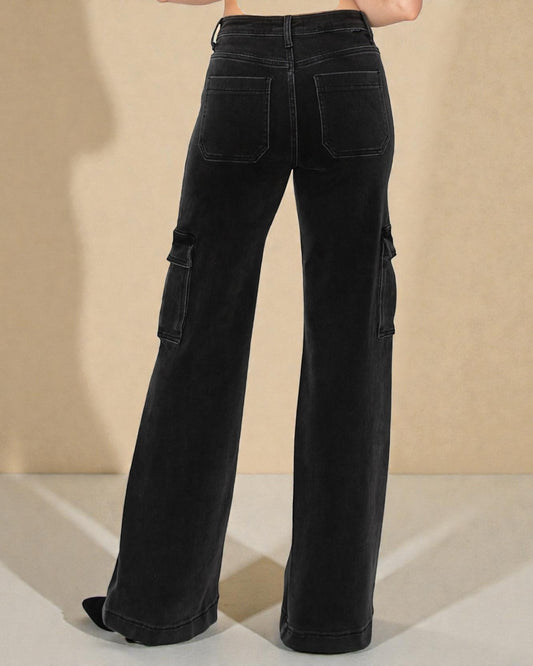 Black wide-leg pants with multiple pockets on a beige background