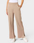 Beige wide-leg pants worn by a person on a light gray background