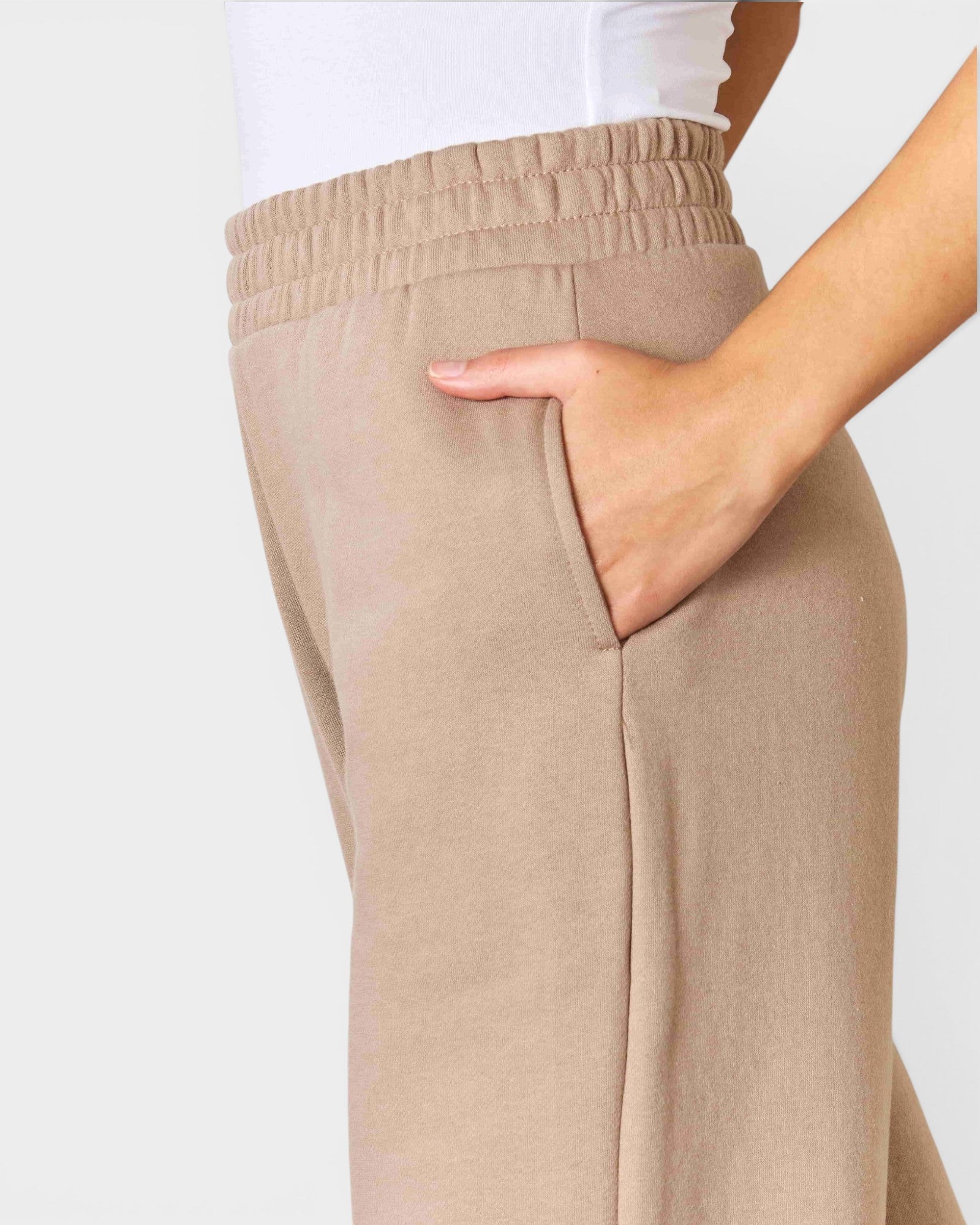 Beige pants with a plain background