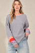 T-shirt à manches longues en tricot gaufré à blocs de couleurs en gris