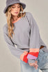 T-shirt à manches longues en tricot gaufré à blocs de couleurs en gris