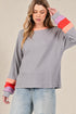 T-shirt à manches longues en tricot gaufré à blocs de couleurs en gris