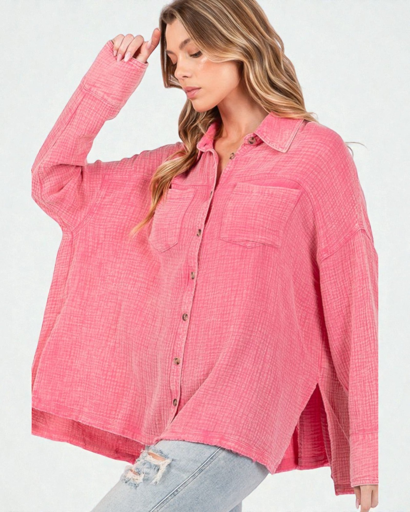 Woman wearing a pink checkered shirt on a white background