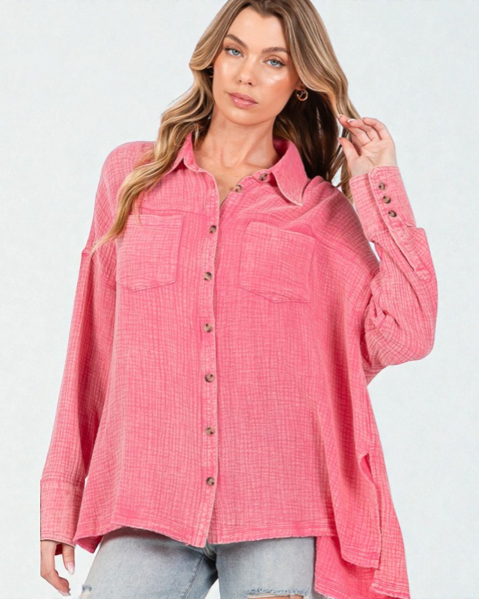 Woman wearing a pink checkered shirt on a white background