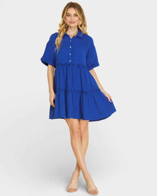 Woman wearing a blue dress on a white background