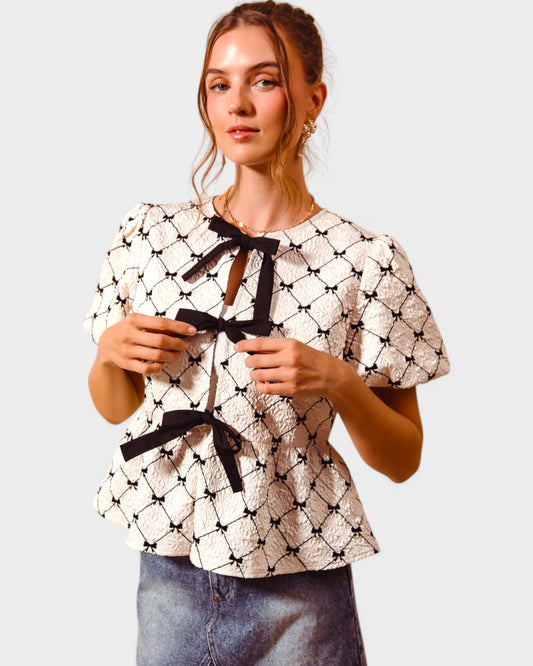Ivory & Black Bow Peplum Top