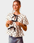 Ivory & Black Bow Peplum Top