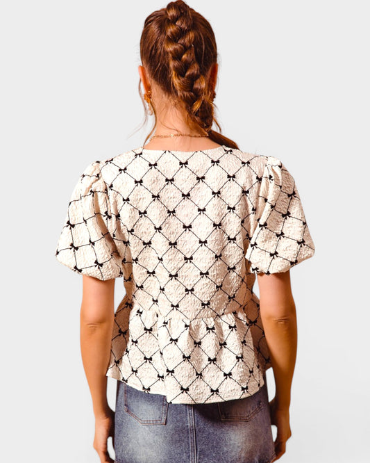Ivory & Black Bow Peplum Top