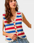 Woman wearing a red, white, and blue striped sleeveless top with lace details.