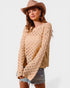 Woman wearing a beige knitted sweater and brown hat on a white background