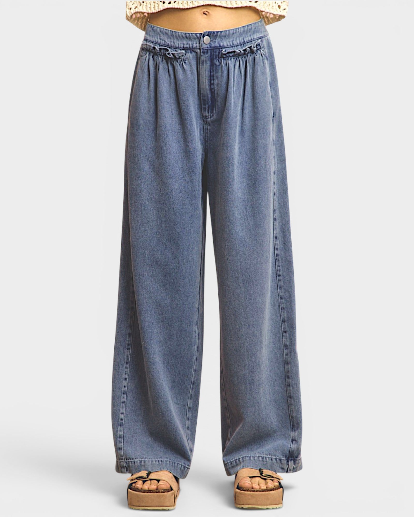 Blue denim wide-leg pants on a white background