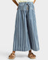 Blue and white striped wide-leg pants worn by a person on a white background