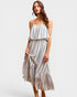 Woman wearing a striped dress on a white background