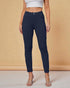Navy blue pants worn by a person on a beige background
