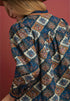 Patterned shirt with a red background