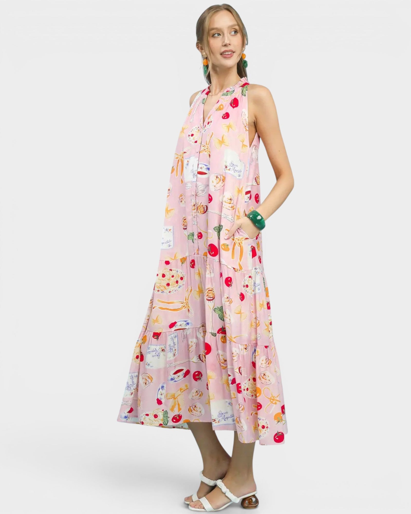 Woman wearing a colorful dress with a white background