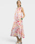 Woman wearing a colorful dress with a white background