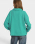 Person wearing a teal sweatshirt on a white background