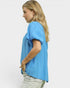 Woman wearing a light blue t-shirt on a white background