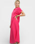 Woman wearing a bright pink dress on a white background